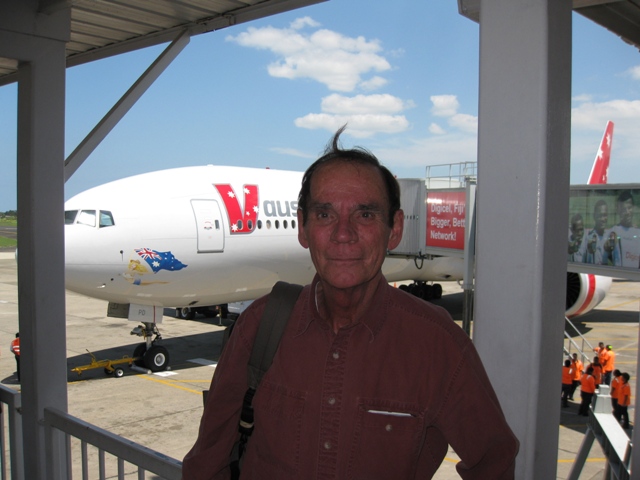 Dennis in front of our plane in Fiji